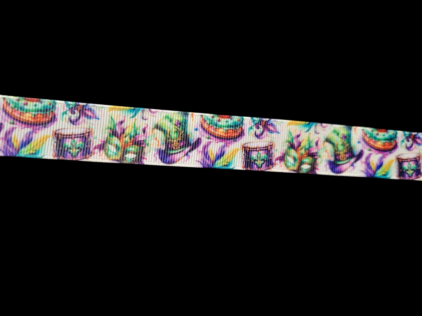 USDR Madri Gras hats, king cakes, and Fleur de lis - Sold by the Yard