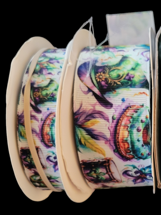 USDR Madri Gras hats, king cakes, and Fleur de lis - Sold by the Yard