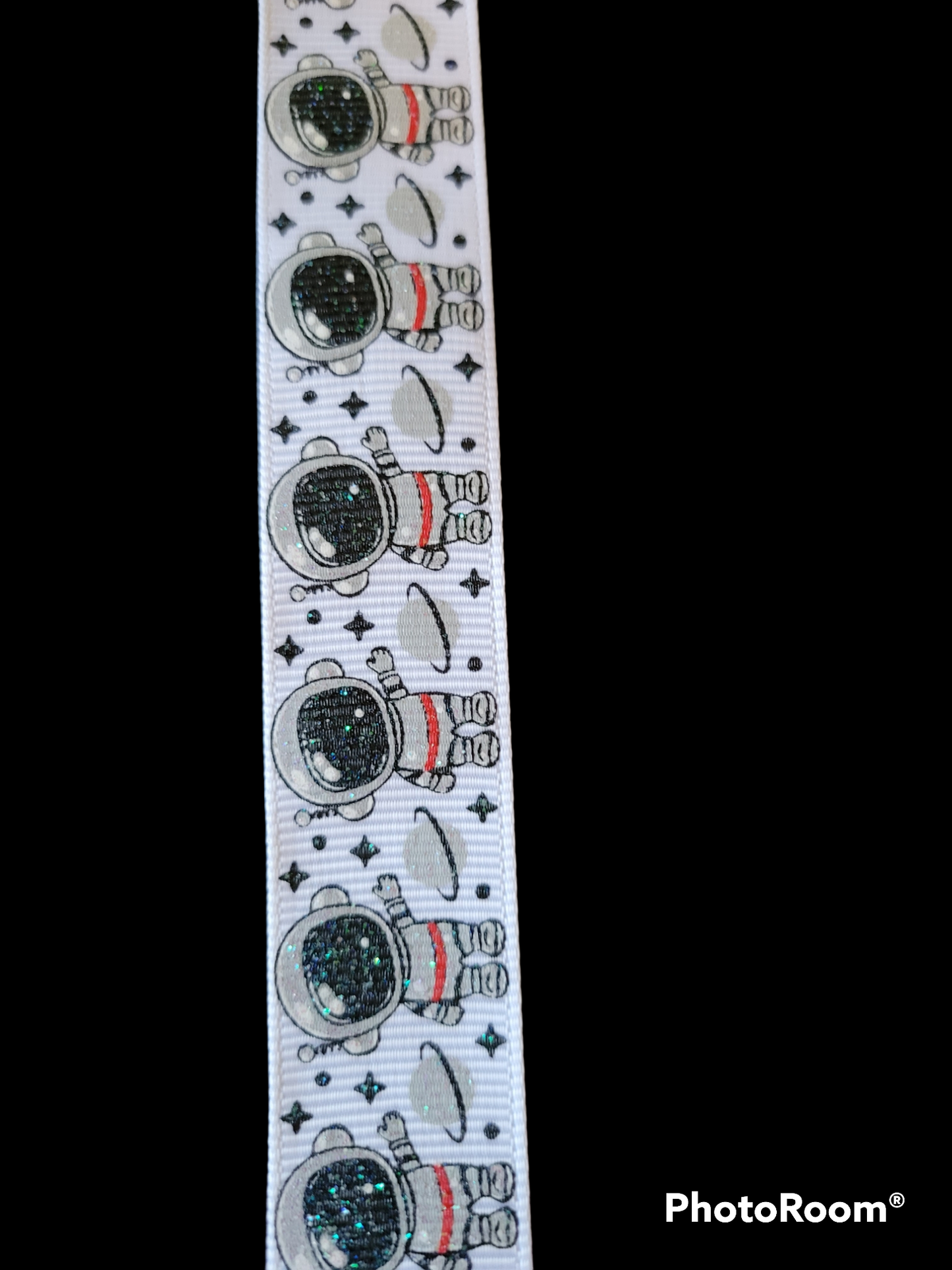 USDR lightly glittered Astronaut with Saturn ribbon